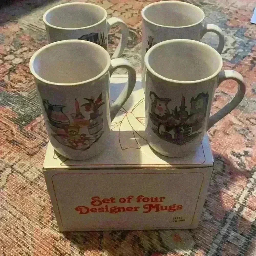 Set of four designer mugs